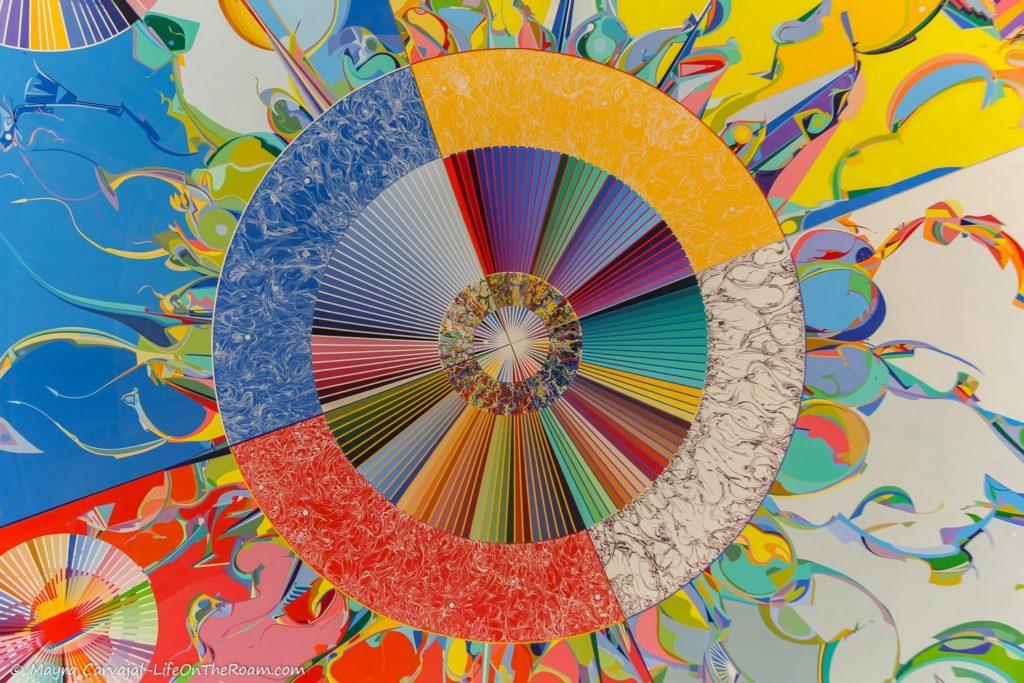 A colourful mural with concentric circles