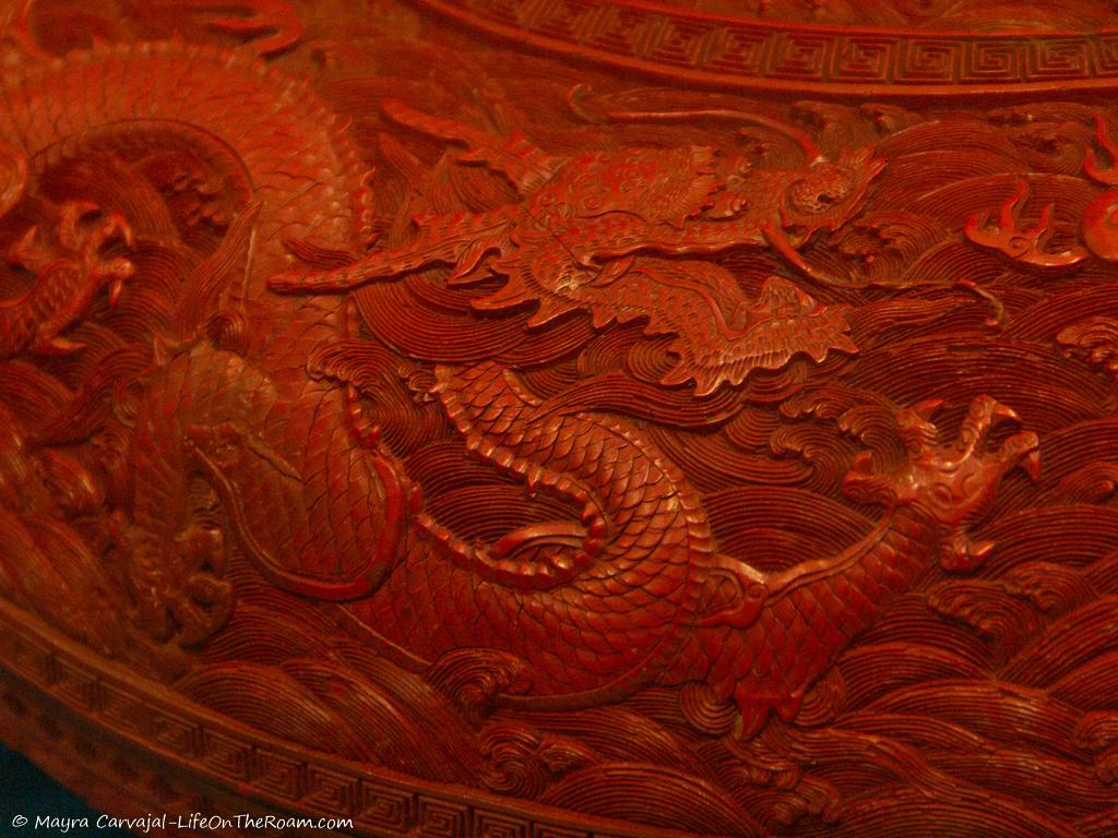 A wood carving in the shape of a dragon