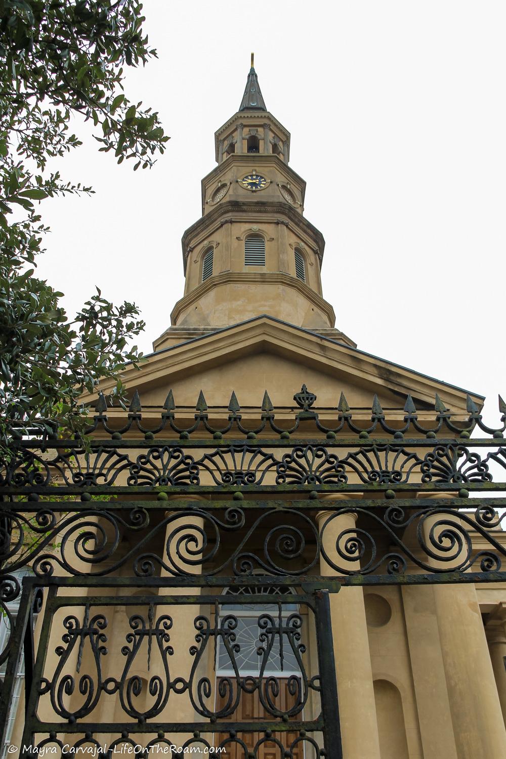 A historic church with an artistic iron gate