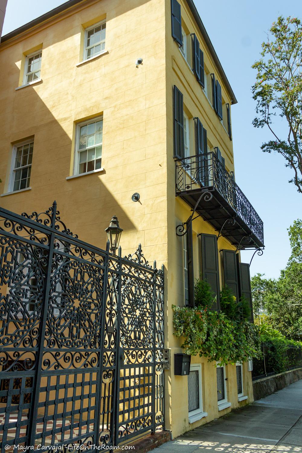 A historic house with an iron gate