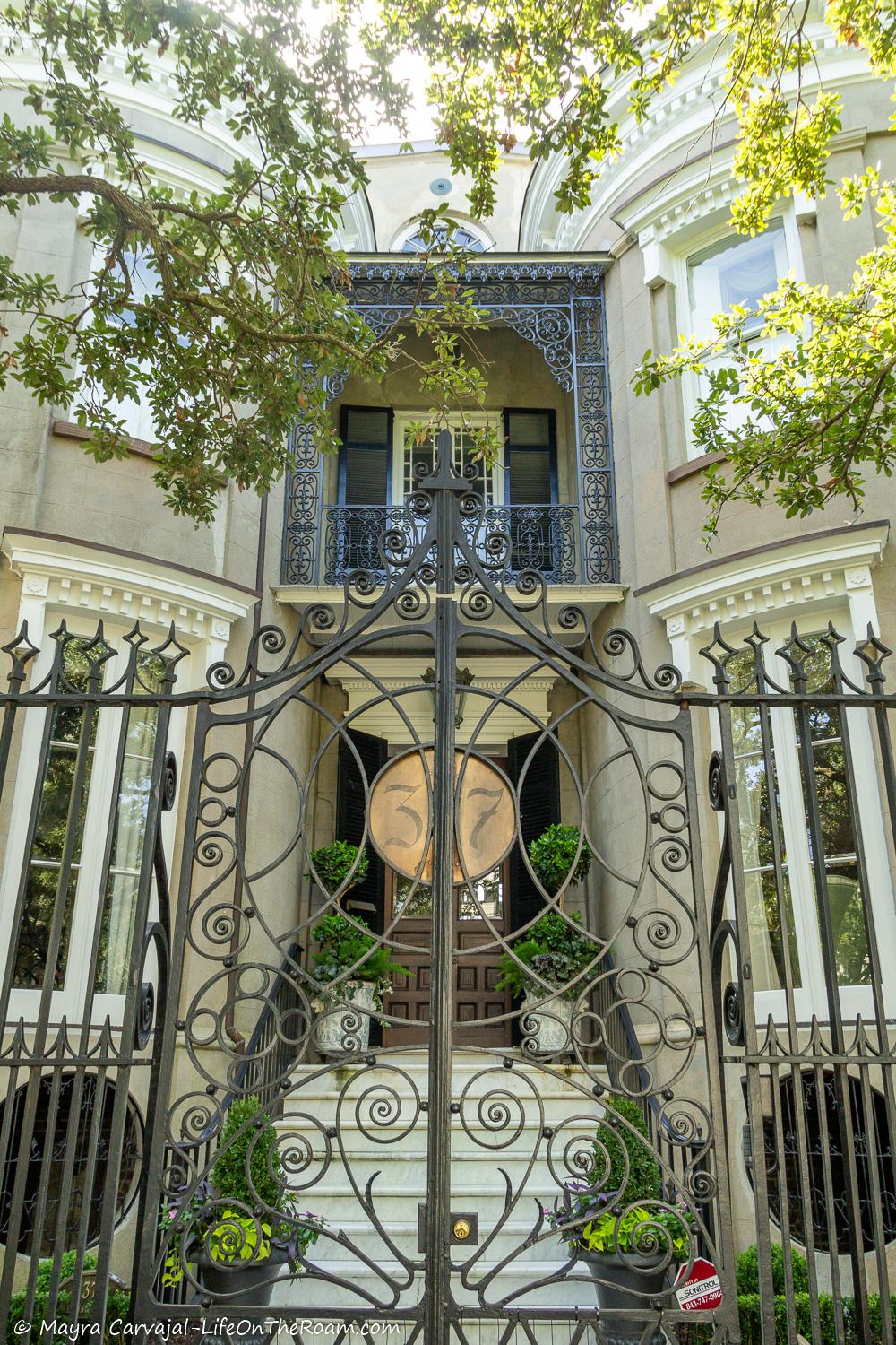 A historic house with an artistic iron gate