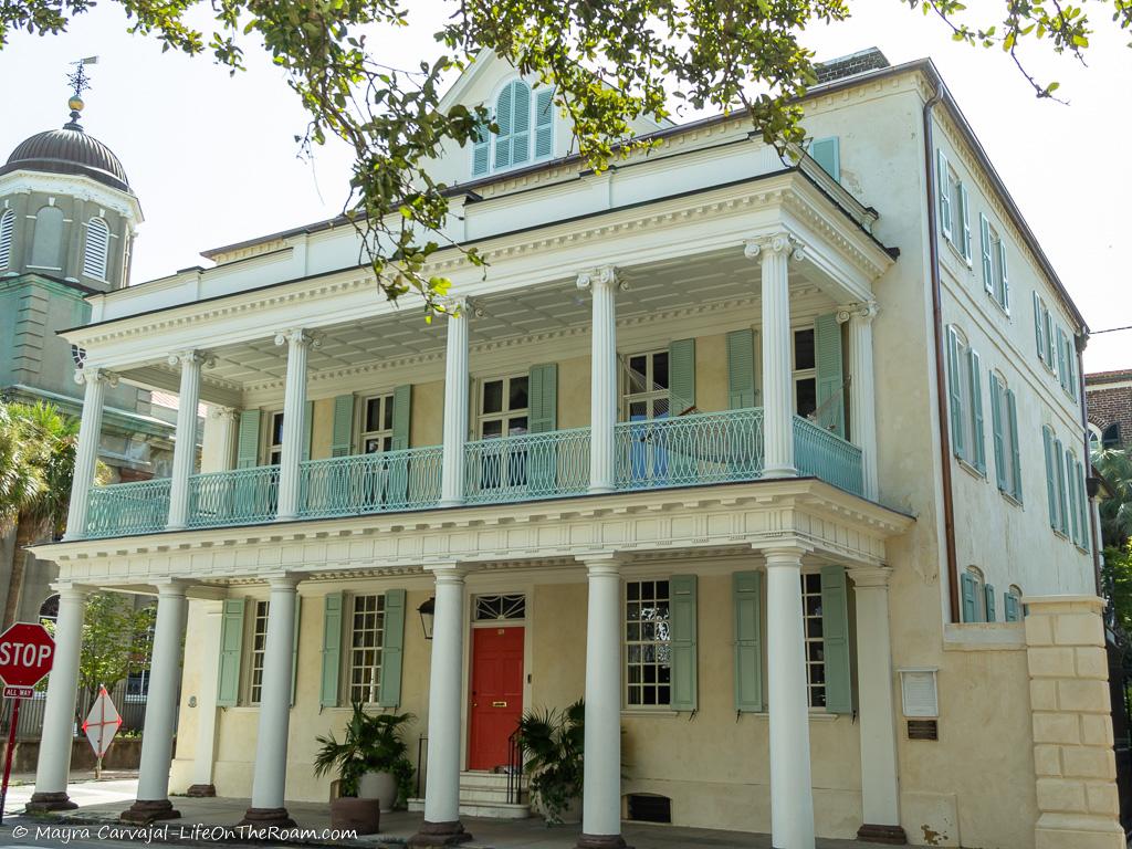 A historic house with a 2-story piazza