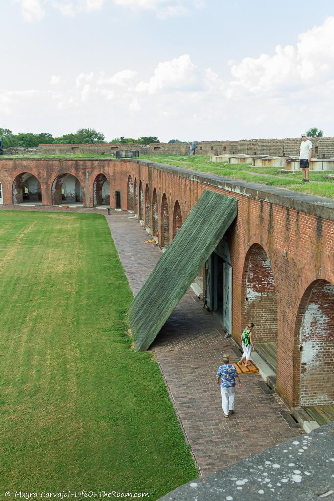 A cannon on top of a fort