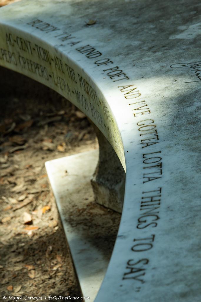 A engraved bench in a cemetery