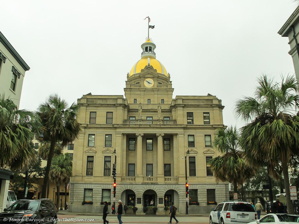 A historic government building with a golden dome