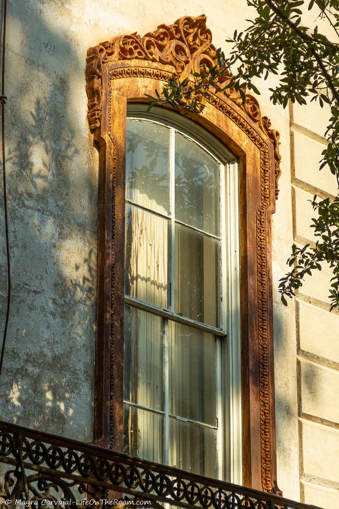 A window with an elaborate trim