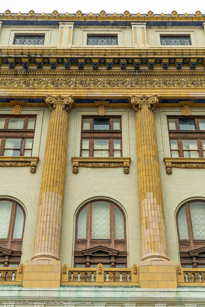 A historic building with blue and yellow ornamentation