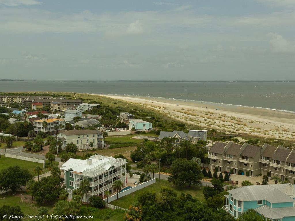 An aerial view of a coastal town and the ocean