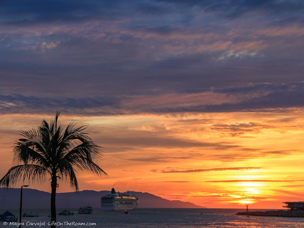 A sunset with violet, orange and yellow tones