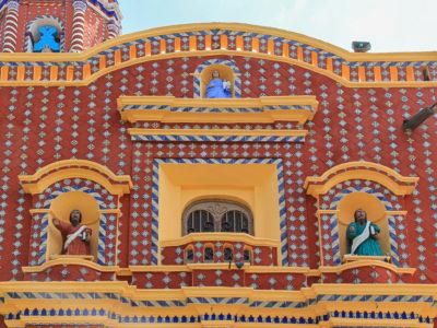 A colourful tiled facade of a church