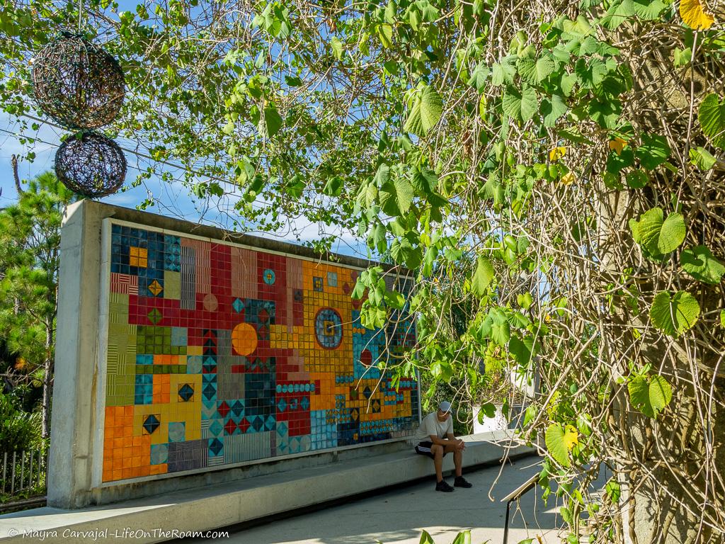 A colourful mosaic mural in the outdoors