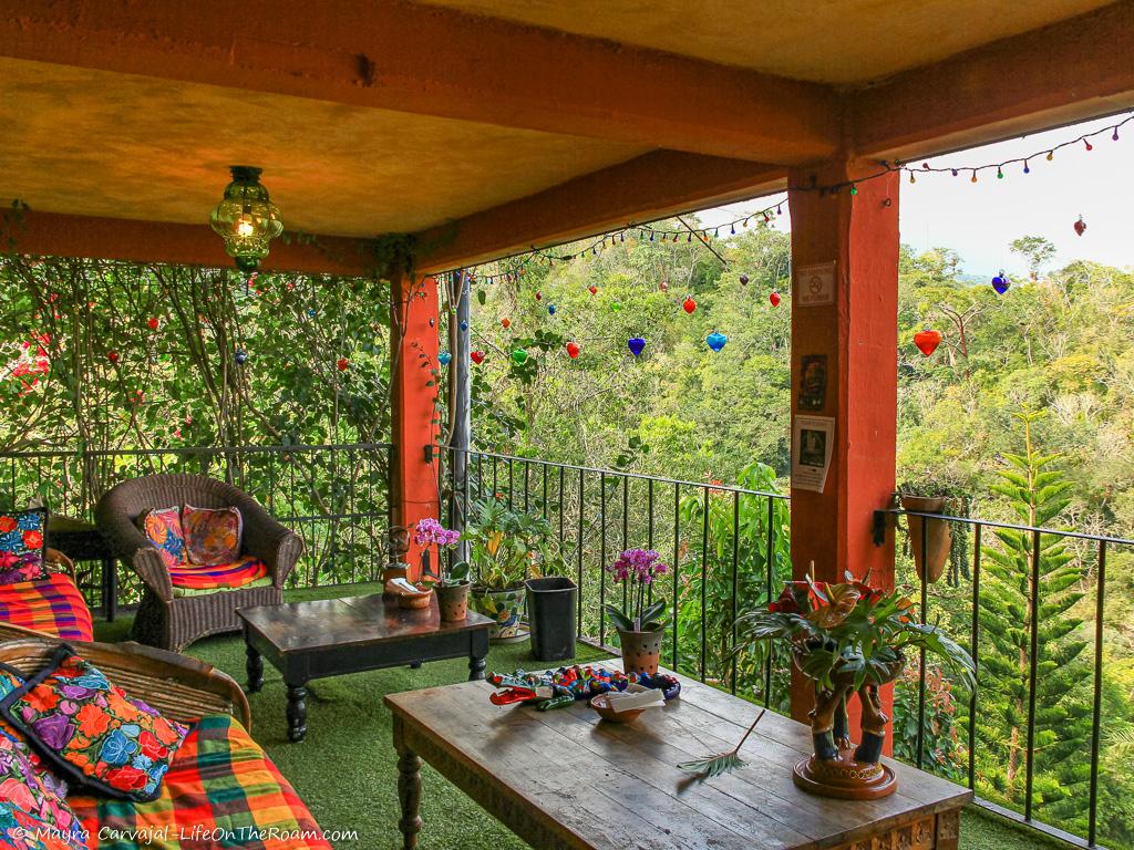 A terrace with lounge seating and a view