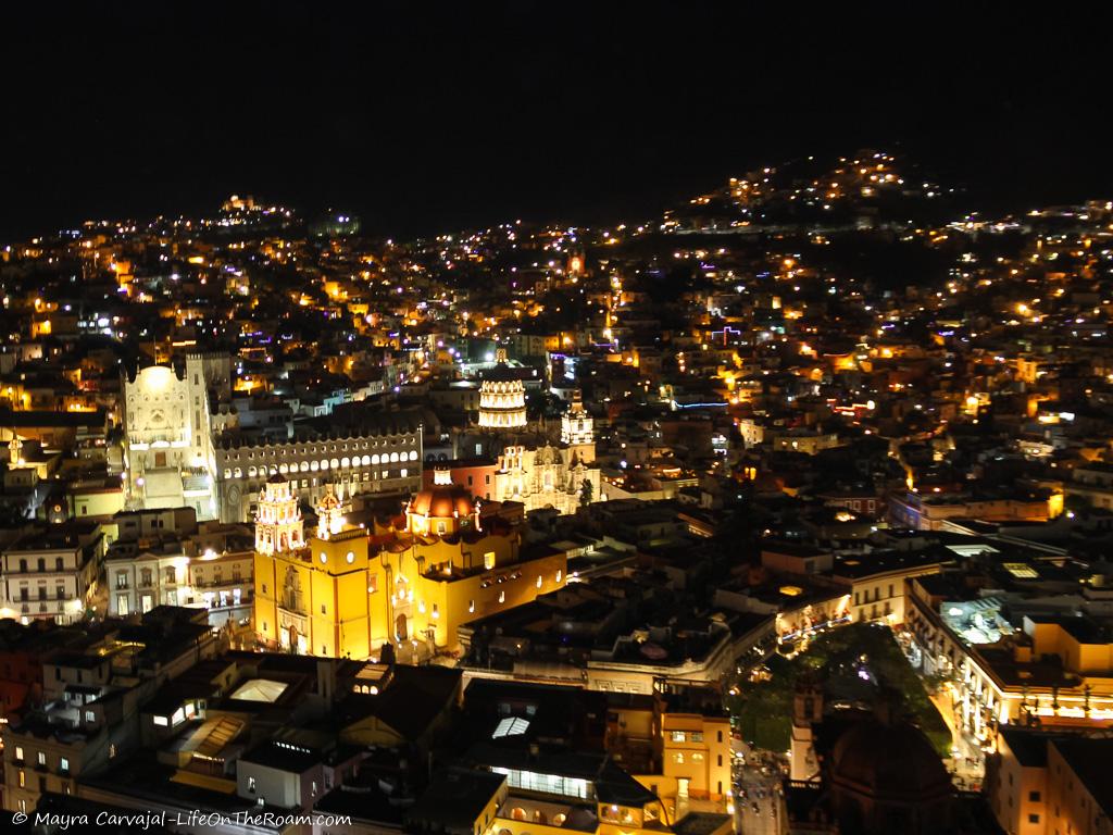 A city view at night from a lookout