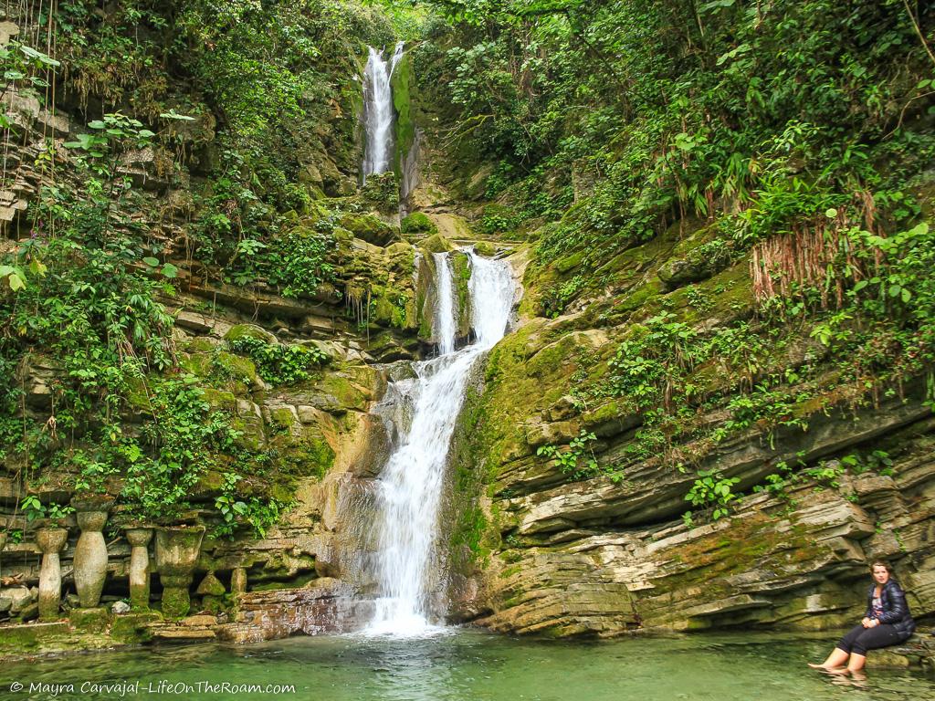 A tall waterfall in a jungles