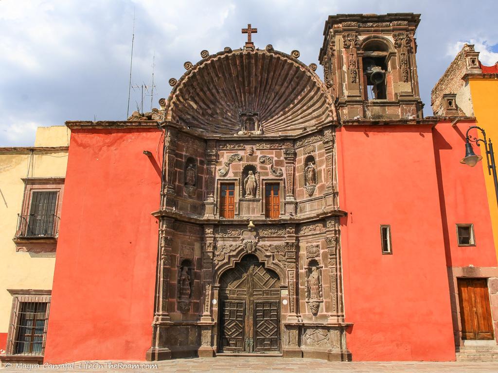 A historic church with a big shell rounding the façade