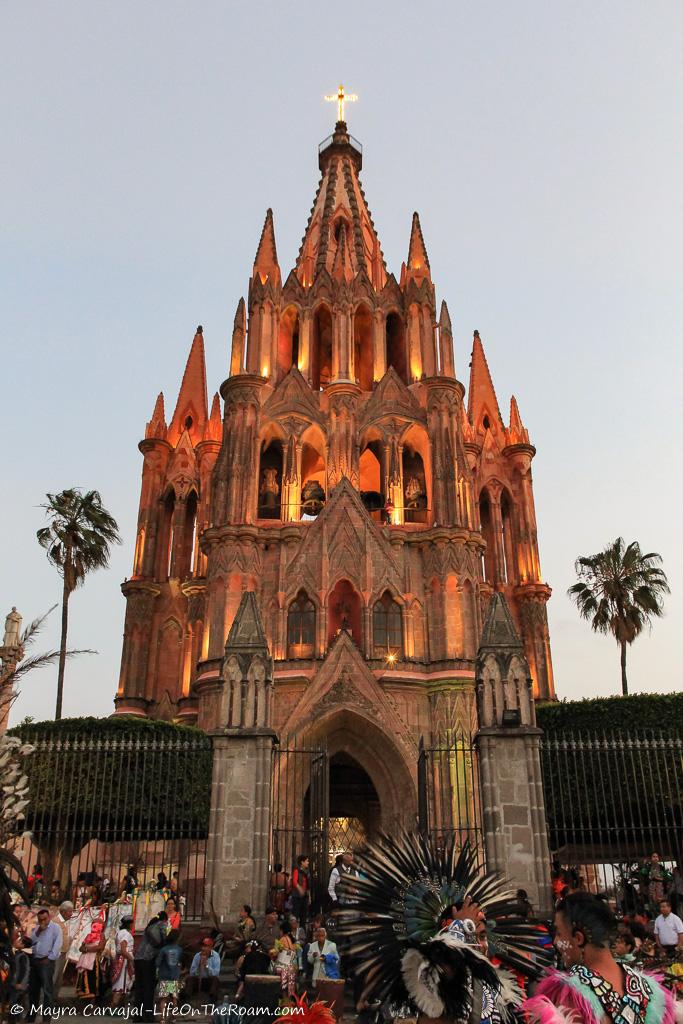 A big church with gothic style and pink hues