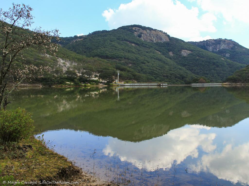 A dam surrounded by mountains