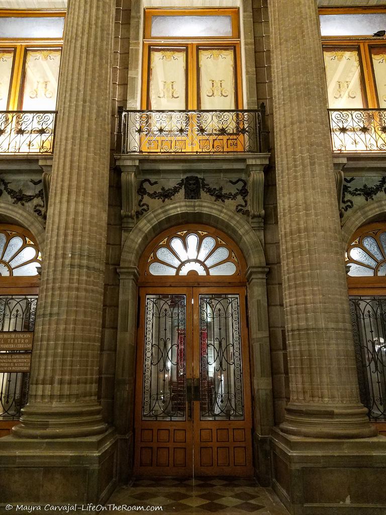 A door flanked by classic stone columns