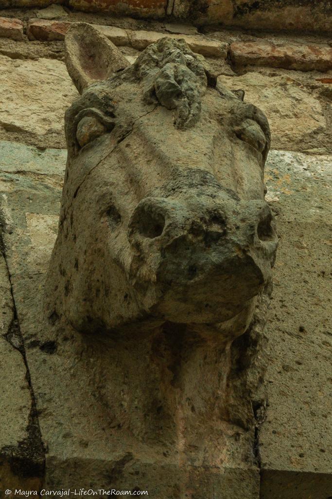 A wall sculpture in the shape of a horse head