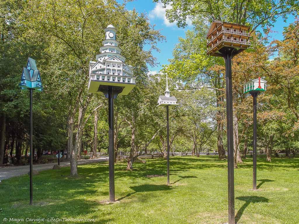 A garden with sculptural birdhouses