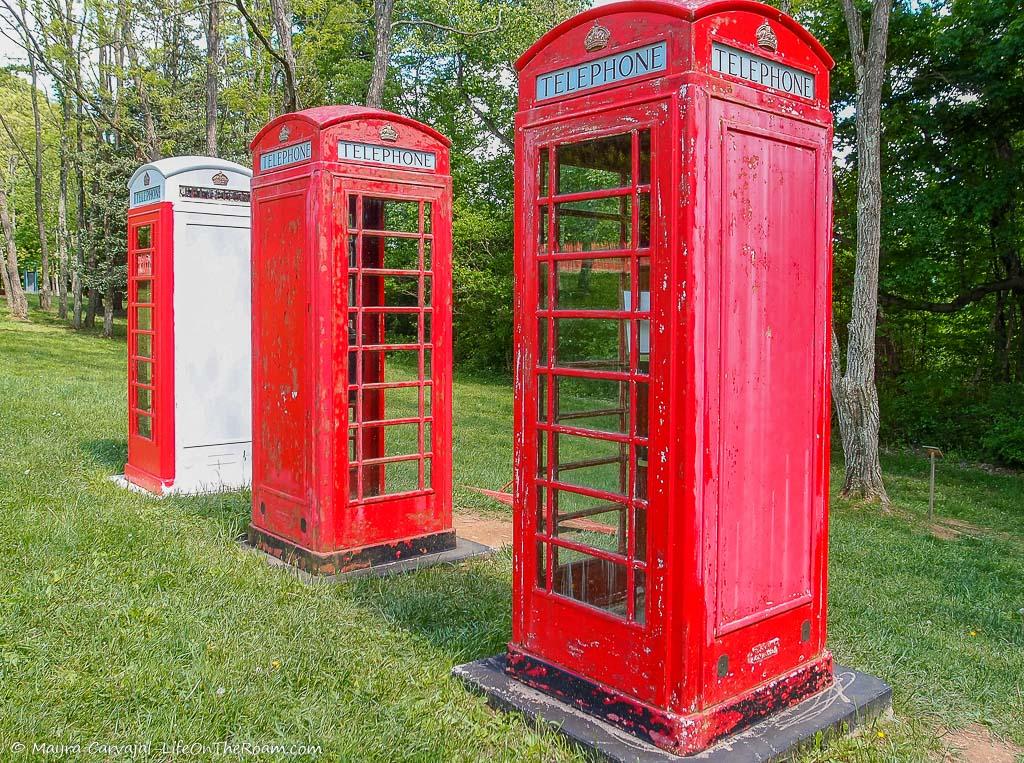 London telephone booths in a garden