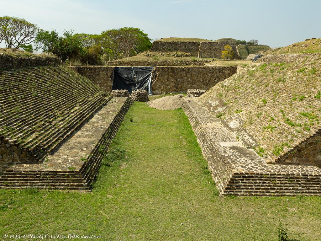 An ancient ball court in an archeological site