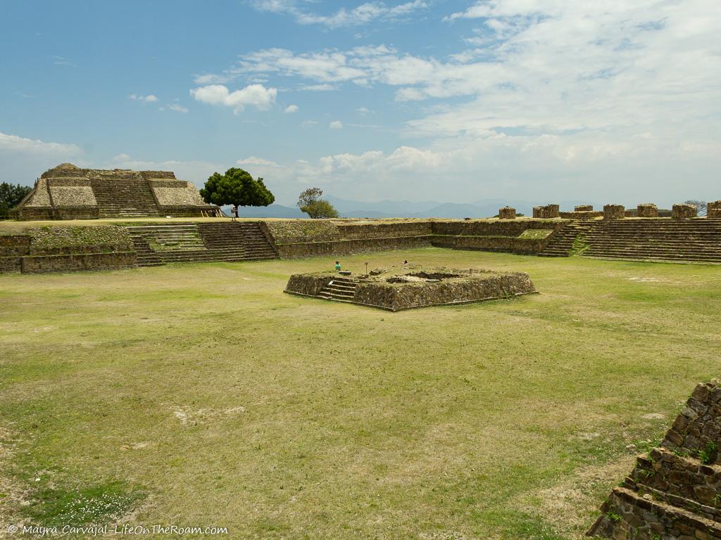 A sunken patio surrounded by ancient temples