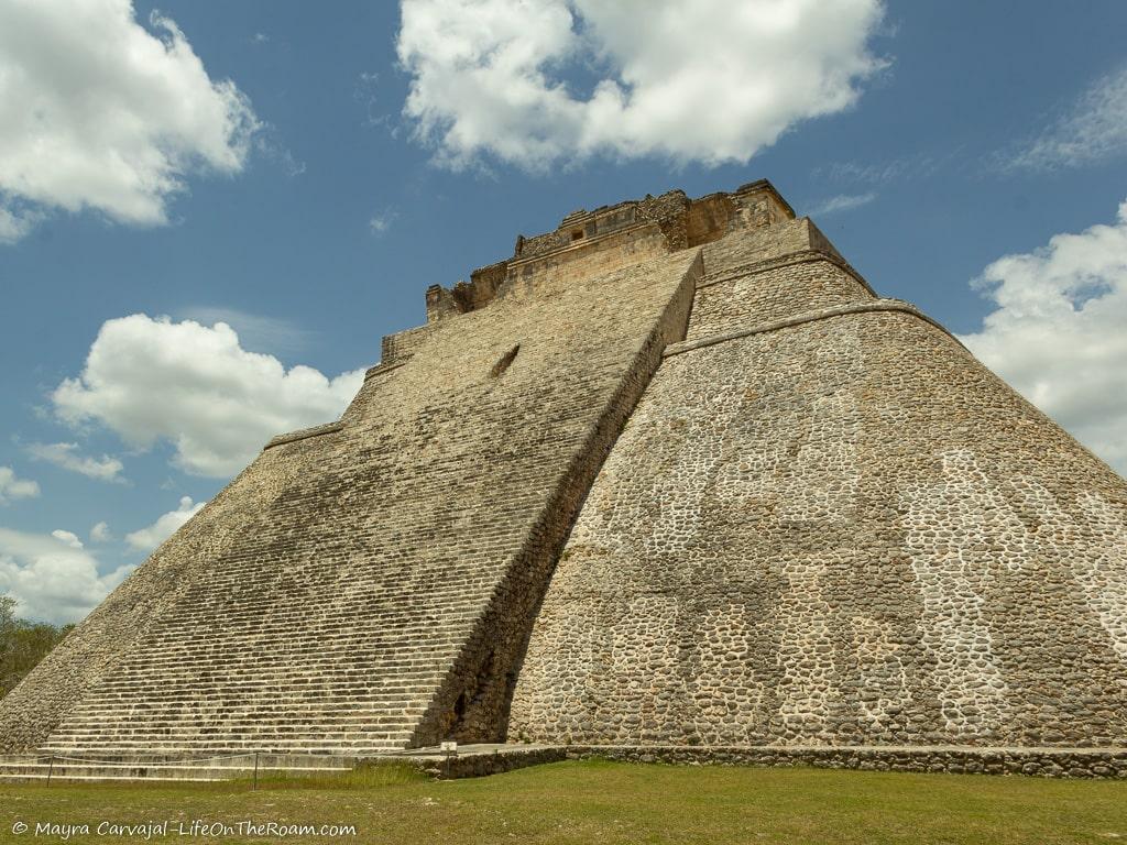 A big pyramid with central stairs and rounded edges