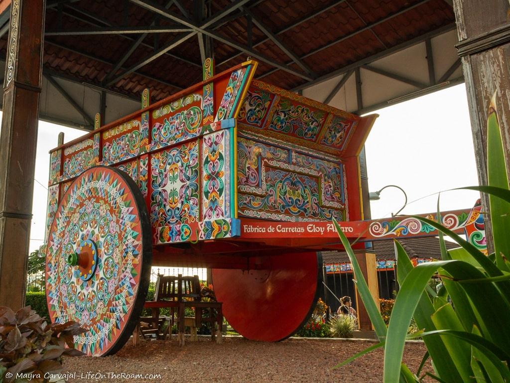 A giant oxcart with decorative paint
