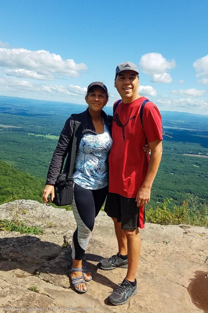 A couple in a mountain overlook