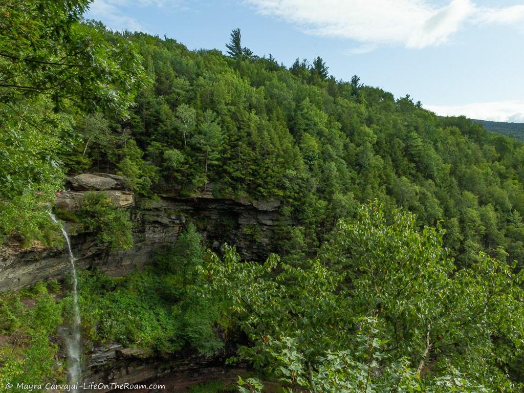 Top view of a tall waterfall in a gorge