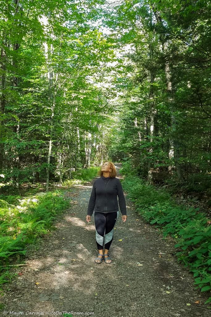 Woman in a wooden trail