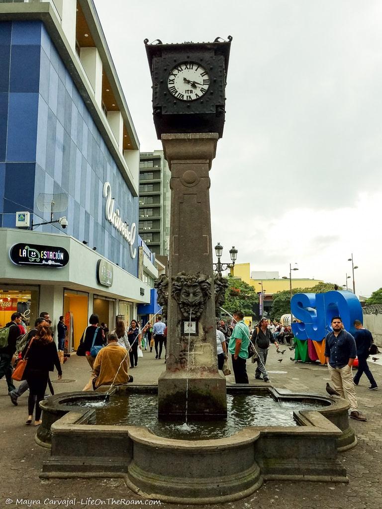 A clock with a fountain