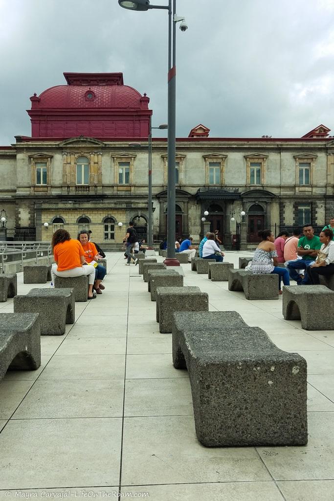 People sitting in a square