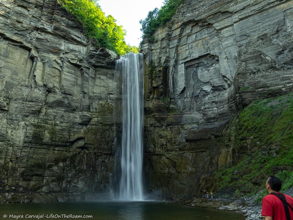 A tall waterfall seeing from the bottom