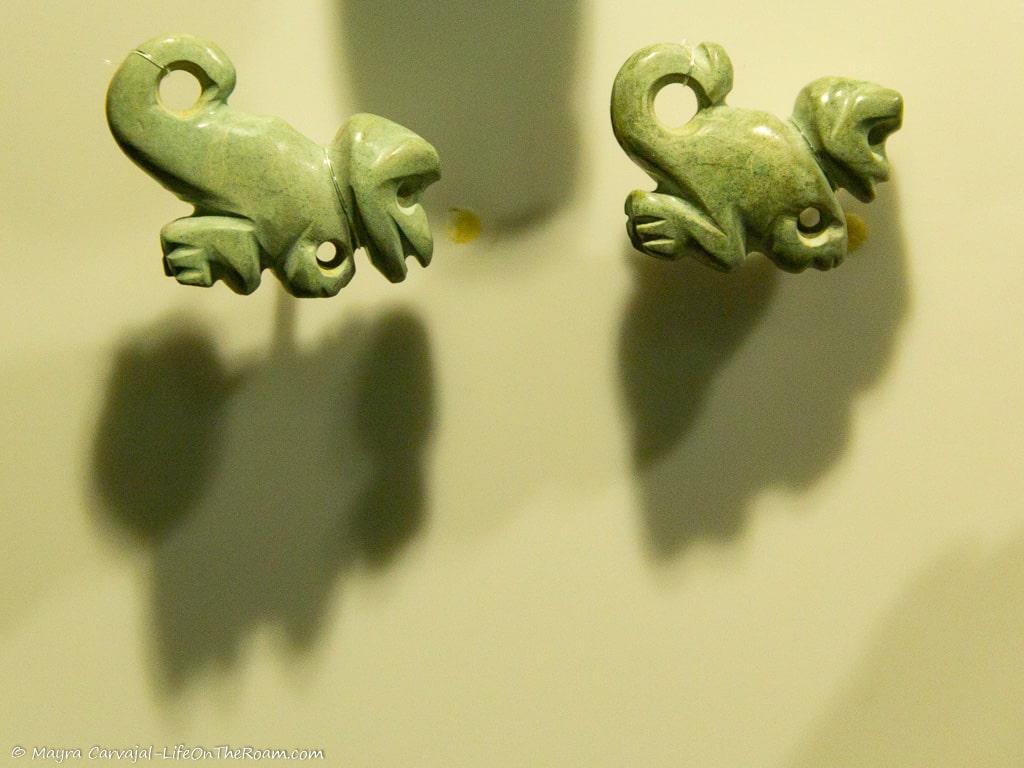 Two jJade pieces with the shape of monkeys