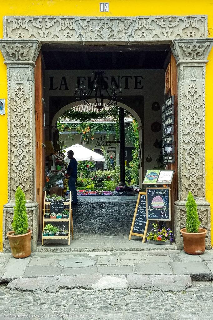 An tall and wide entrance of a colonial style house