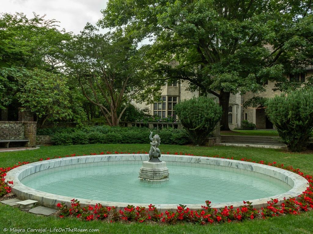 A round fountain with a sculpture