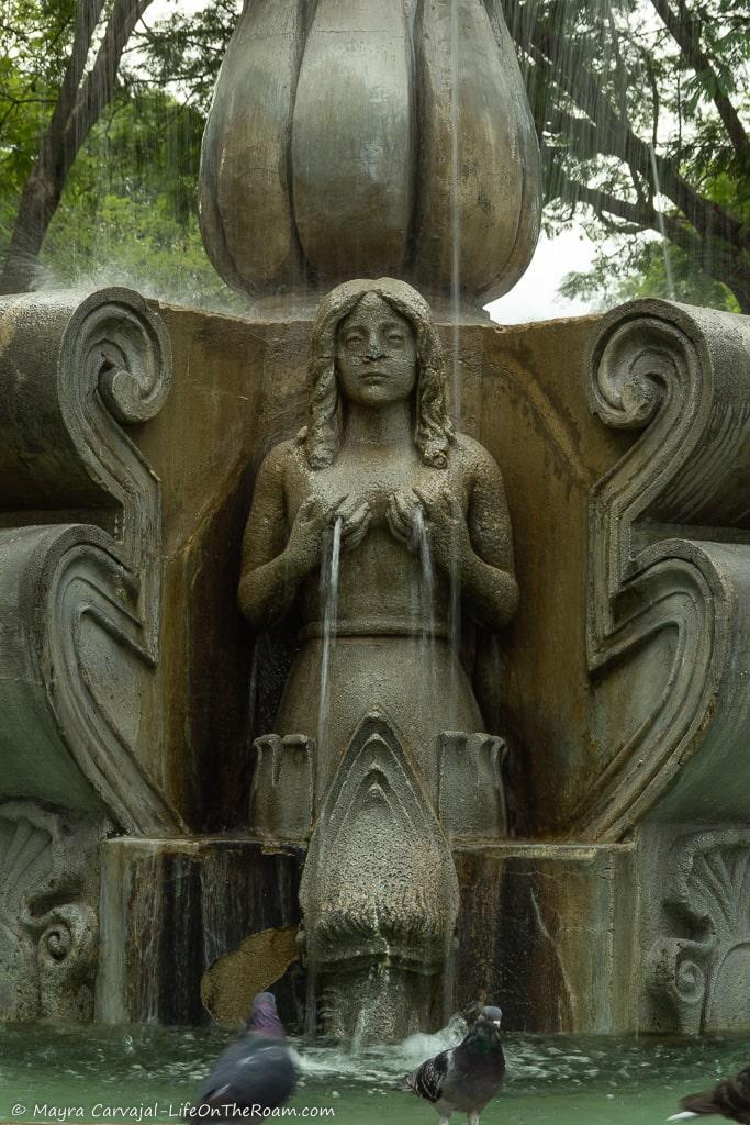 The status of a mermaid in a fountain