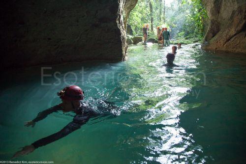 Man swimming inside a cave