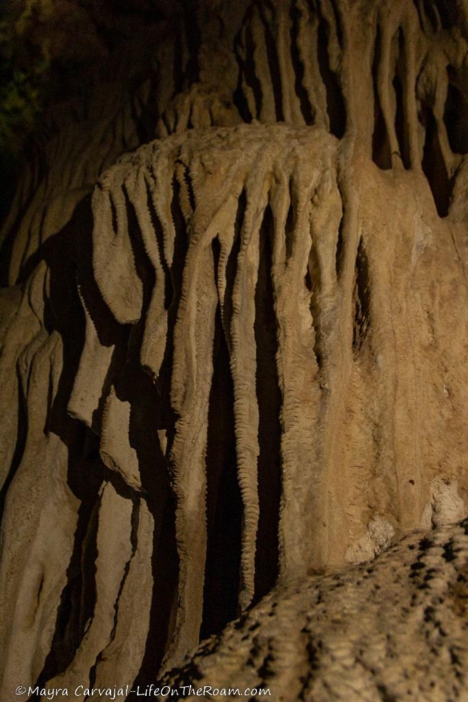 A calcium carbonate formation resembling a frozen waterfall