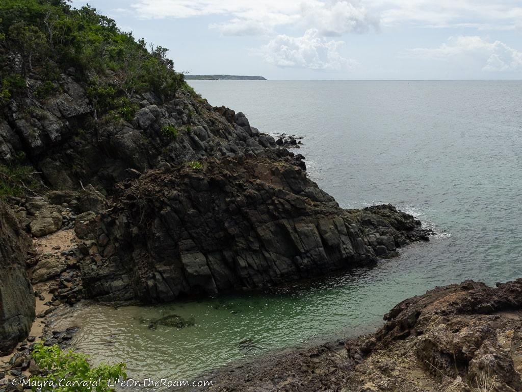 A narrow beach between two cliffs