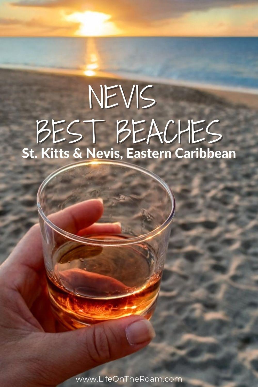 A sunset at a sandy beach with a glass of rum in the foreground and the text "Nevis Best Beaches, St Kitts & Nevis, Eastern Caribbean"