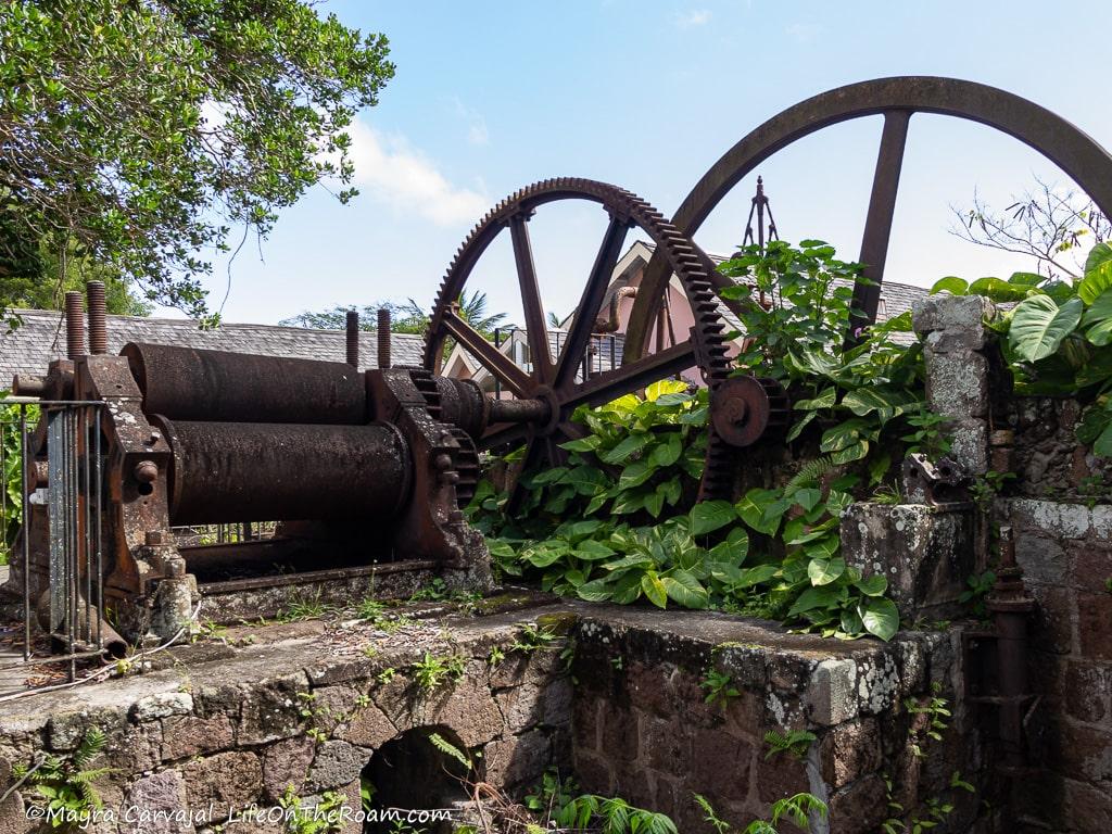 Old machinery with metal wheels and pipes