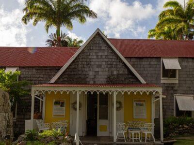 A traditional Caribbean House from the 17th century with a yellow porch