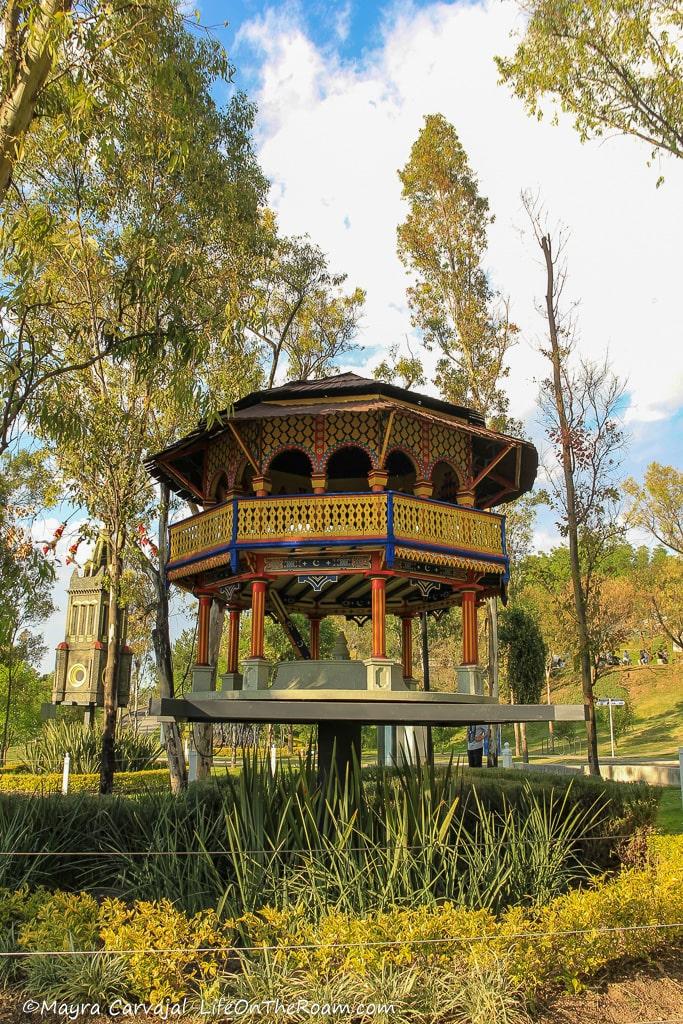 A scale model of a decorated kiosk in a square