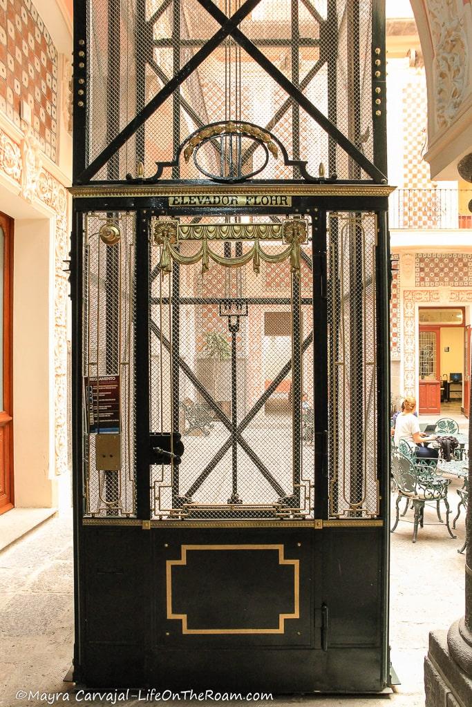 An old style elevator in a courtyard