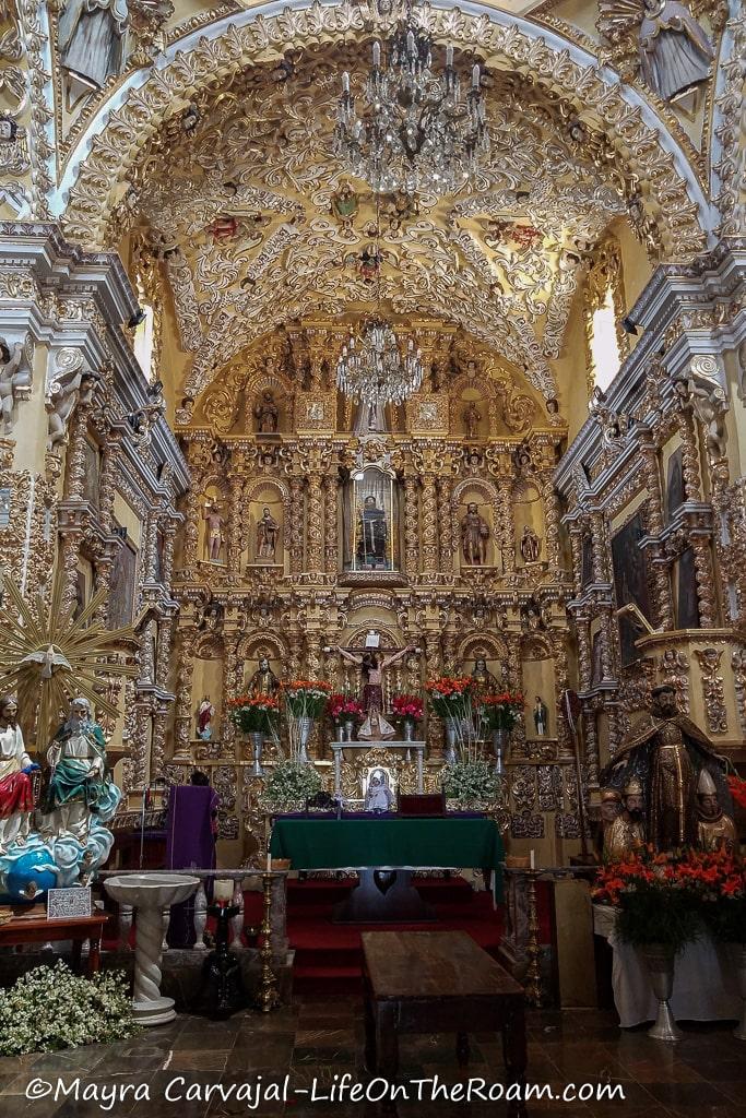 A heavily ornate golden altar