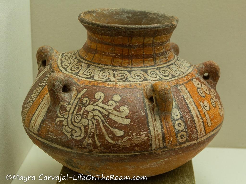 Polychrome ancient pottery with hand painted motifs