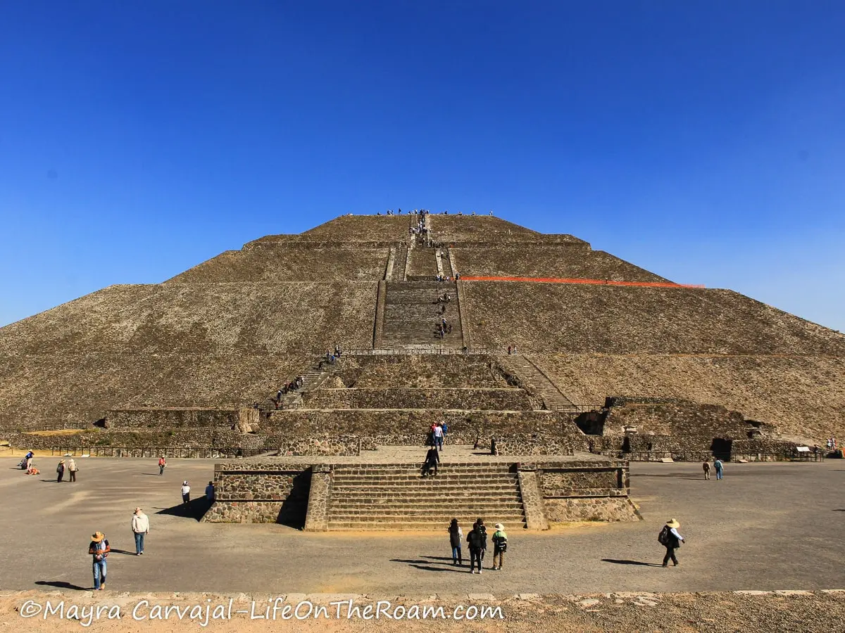 A large pyramid with a platform in the foreground